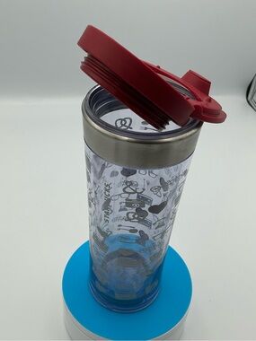 Travel Starbucks Tumbler with Red Flip Lid and Clear Printed Body